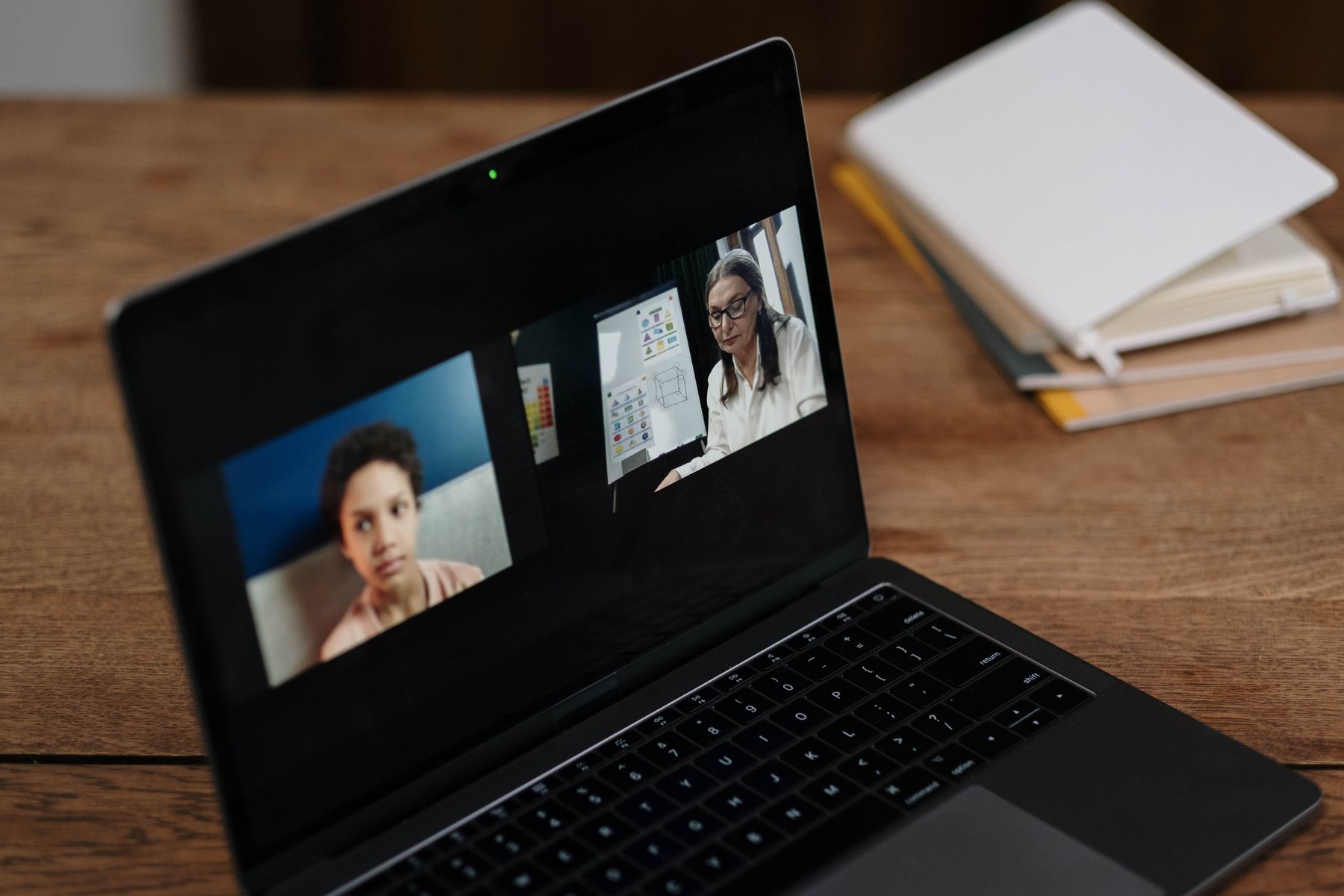 Student following an online class on a laptop